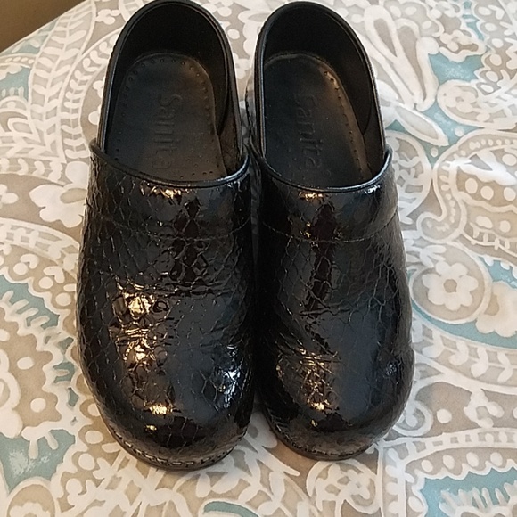 sanita black patent clogs
